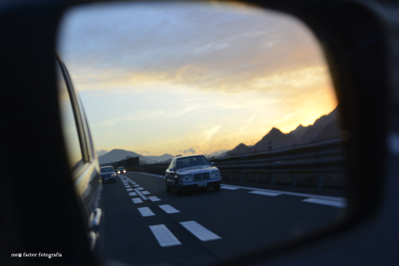 on the expressway heading back to Tokyo at sunset